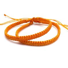 "These lovely heart bracelets are perfect for any occasion. Choose from the options the Father and Son bracelet set, the adult's bracelet or the kid's bracelet. The kid's bracelet closes to 4.5\" and the adult's bracelet closes to 5.5\". Both bracelets are adjustable." Cheap Orange Braided Bracelets As Gift, Orange Bohemian Braided Bracelet Gift, Cheap Adjustable Orange Braided Bracelets, Cheap Orange Hand-strung Friendship Bracelets, Playful Adjustable Orange Bracelets, His And Hers Bracelets, Orange Macrame, Bohemian Orange Hand-strung Bracelets, Heart Bracelets