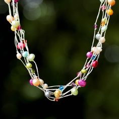 Anusara designs a bright necklace that glows with festive colors. She crafts the necklace by hand with pearls and glass beads floating on a silken gossamer. Beaded Pearl Necklace, Gifts For Travelers, Bright Necklace, Silver Strand, Buy Pearls, Cool Necklaces, Women Artisans, Jewelry Packaging, Party Balloons