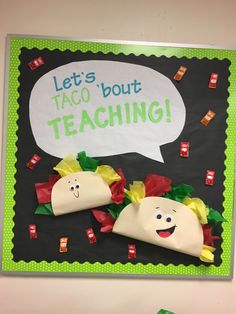 a bulletin board with two tacos on it