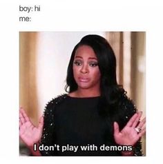 an image of a woman with her hands out and the caption says, i don't play with demons