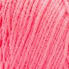 a pink crocheted blanket is shown in close up