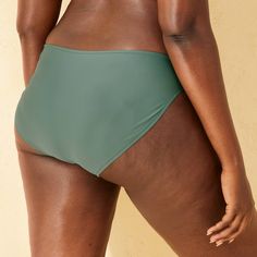 Put together a comfy, beach-ready swim outfit with this Low-Rise Full-Coverage Hipster Bikini Bottom from Shade & Shore™. Made from soft fabric with spandex and a full lining in a solid hue, this hipster bikini bottom offers stretchy comfort in and out of the water. Designed with a low rise and full coverage, it also features elastic at the leg openings for a flexible fit. Shade & Shore™: Found exclusively at Target. Uv Protection Swimwear With Tie-side Bottom, Uv Protection Tie-side Swimwear, Fitted Swim Skirt For Vacation, Nylon Swimwear For Vacation Swimming, Lightweight Solid Color Swimwear For Beach Season, Green Lined Tankini For Beachwear, Green Swimwear With Upf 50+ For Sports, Green Swimwear For Vacation Swimming, Stretch Nylon Swimwear For Vacation