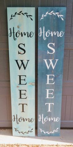 two wooden signs that say home and sweet home