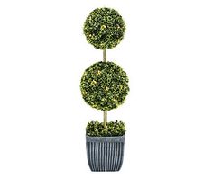 three potted plants are arranged in the shape of balls on top of each other