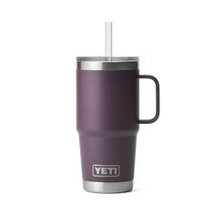 the yeti travel mug is purple and has a straw in it's cup