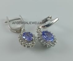 "Stone Name = Tanzanite Stone Colour = Blue Stone Shape = Oval Cut Stone Size = 7×5 M.M Closure : Latch Back Quality :- AAA Brand Name = AFGEMSNJEWELLRY Metal:- 925 Sterling Silver Handmade Stud Earrings STUD EARRINGS FOR ALL OCCASION These silver stud earrings make a gorgeous gift for a loved one - for mom, sister, girlfriend, wife or friend - for any occasion such as a birthday, a graduation, an anniversary, Christmas, or Valentines' Day gift. Ideal for those who like their style to be simple, Color Changing Ring, Tanzanite Jewelry, Tanzanite Earrings, Stone Colour, Tanzanite Stone, Natural Tanzanite, Silver Stud Earrings, Earrings Stud, Gorgeous Gift