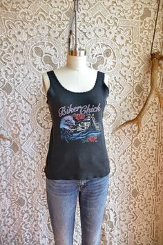 "I love these vintage lace trim biker tanks! This one is in soft rib knit cotton, and features an awesome eagle and motorcycle graphic. Both tough and feminine, this sweet tank will add some rocker chick appeal to your wardrobe! By American biker, It is marked size extra large, but could fit a large or medium as well, see measurements for details. All measurements taken flat across. Measurements Shoulder: N/A Bust: 20\" Sleeve: N/A Length: 22\"" Gauze Pants, Rocker Chick, Cotton Sundress, Biker Chick, Peasant Dress, Knit Cotton, Vintage Lace, Tank Tops Women, Lace Trim