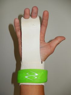 a person's hand with a wrist band wrapped around it