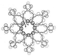 a snowflake is shown in black and white, with circles on the bottom