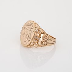 Finely detailed antique Victorian oval signet ring (circa 1880s to 1900s), crafted in 10 karat yellow gold.   The centre oval is engraved in old script with the initials (from what we can decipher) "FCS"   The side shoulders feature a pretty scrolled design, terminating to the oval mount. The saddle of the ring is low and curves to the shape of the finger.     The ring is in very good condition and was recently professionally cleaned and polished.    Particulars:  Weight: 8.2 grammes  Stones:  N Victorian Style Signet Ring With Intricate Design, Victorian Signet Ring With Intricate Design, Victorian Yellow Gold Initial Ring, Victorian Rings With Engraving Option For Anniversary, Classic Oval Engraved Ring With Hallmarks, Hallmarked Oval Initial Ring In Rose Gold, Formal Oval Signet Ring With Initials, Formal Signet Ring With Initials, Oval Signet Ring With Initials For Formal Occasions