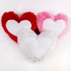 three heart shaped stuffed animals sitting next to each other on a white background with the caption 4 pcs / lot