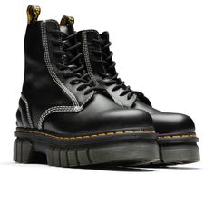 Dr. Martens introduces the Air Wair Women’s Audrick 8I Quilted Boot. Taking on a nappa leather upper, the boot features branded heel pull tabs in addition to contrasting stitching seen throughout the seams. Signature yellow welt stitching is heat-enforced, offering a detailed touch. The EVA midsole and Airwair rubber o Dr Martens Audrick, Mens Leather Chukka Boots, Platform Boots Women, Quilted Boots, Platform Chelsea Boots, Contrasting Stitching, Leather Chukka Boots, Spring Step Shoes, Black Combat Boots