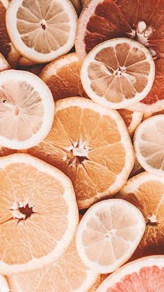 oranges and grapefruits cut in half