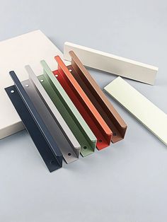 several different colors and sizes of plastic sheets