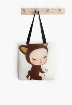 a tote bag with an image of a monkey holding a cup in its hand