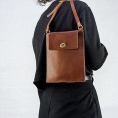 Everyday Smooth Grain Crossbody Shoulder Bag, Everyday Smooth Grain Crossbody Satchel, Smooth Grain Leather Crossbody Backpack For Everyday Use, Everyday Smooth Grain Saddle Shoulder Bag, Classic Everyday Shoulder Bag With Waxed Finish, Smooth Grain Leather Shoulder Backpack, Everyday Use Smooth Grain Standard Backpack, Leather Crossbody Shoulder Strap With Long Strap, Tan Leather Bag With Adjustable Strap