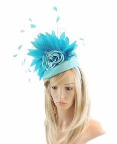 Hats By Cressida Kentucky Derby & Ascot Fascinator Hats Hanneli Kentucky Derby Oaks Fascinator Hat Gorgeous silk rose trimmed with coque feathers and hackle on a pillbox base Base measures about 6 inches wide Mounted with a matching headband. If you prefer a headband to match your hair, please make a note at check out what colour headband you want. We make each hat to order and can add or change colours just email us with what you need. We can also make a custom design for you if you have someth Turquoise Fascinator For Spring Party, Turquoise Headpiece For Summer Wedding, Turquoise Headpieces For Summer Weddings, Spring Turquoise Headpiece For Parties, Turquoise Spring Party Fascinator, Spring Party Turquoise Fascinator, Elegant Turquoise Headpiece For Wedding, Turquoise Summer Wedding Headpiece, Summer Wedding Turquoise Headpieces