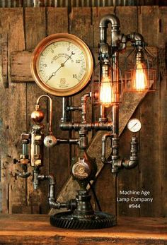 an old fashioned steam engine lamp with a clock on the wall next to it,