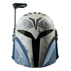 the helmet is designed to look like an owl's head, and has blue paint on it