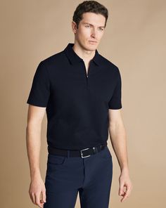 96% cotton, 4% elastane, Moisture-wicking, Sweat repellant, Water repellant, Zip Placket, Spread collar, Performance logo, Machine washable - Performance Zip Neck Polo - French Navy | Men's Charles Tyrwhitt Performance Zip Neck Polo Shirt - French Navy Blue Size Large Cotton Navy Cotton Moisture-wicking Polo Shirt, Functional Cotton Polo Shirt With Moisture-wicking, Functional Moisture-wicking Cotton Polo Shirt, Fitted Cotton Polo Shirt, Fitted Functional Cotton Polo Shirt, French Navy Blue, Black Suit Wedding, Smart Jackets, Morning Suits