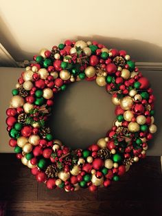 a christmas wreath is hanging on the wall