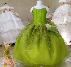 Beautiful green dress, perfect for any special occasion. You could use it as Princess Tiana or Thinker bell. Green Dresses With Fitted Bodice For Formal Occasions, Green Dress With Fitted Bodice For Formal Occasions, Green Formal Dress With Fitted Bodice, Elegant Green Holiday Dress, Elegant Lime Green Evening Dress, Green Princess Party Dress, Elegant Green Dress For Fancy Occasions, Elegant Kelly Green Dresses For Spring, Green Sleeveless Dress For Dress-up Occasions