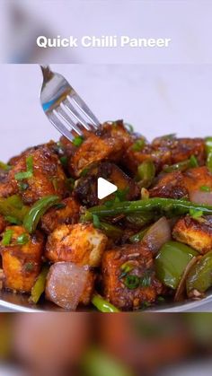 a plate full of food with a fork sticking out of the top and an ad for quick chilli paneer