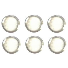 six white lights are shown in the middle of a set of four circular buttons on a white background