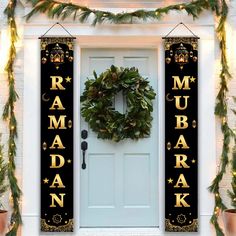 a decorated front door with two christmas decorations and a wreath hanging on it's side