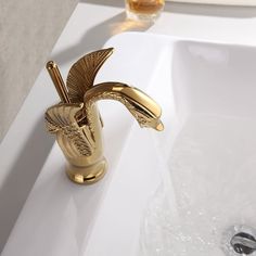 Swan Classic Style 1-Hole Solid Brass Bathroom Sink Faucet | Homary Swan Tap Bathroom, Swan Faucet, Gold Swan Faucet, Gold Vessel Sink Faucet, Brass Bathtub Faucet, Gold Swan, Angel Fire, Bathroom Ambiance, Beautiful Swan