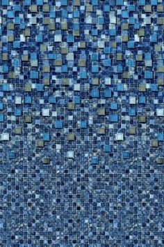 a blue mosaic tile wall with small squares