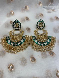 These beautiful hand painted earrings perfect for any event available in 3 colours.  No returns and no refunds. Care instructions: Please keep away from perfume, water and harsh chemicals. To clean please just wipe with a clean dry fibre cloth. Enamel Earrings For Wedding, Handmade Enamel Earrings For Party, Green Enamel Jewelry For Wedding, Green Earrings For Festive Occasions, Green Festive Earrings For Festivals, Festive Green Earrings For Festivals, Green Enamel Wedding Jewelry, Hand Painted Festive Earrings For Festivals, Traditional Hand Painted Earrings For Festivals