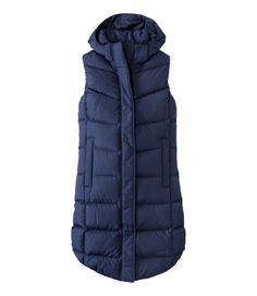 Add cozy warmth and fun novelty to your cool-weather outings with our hooded down vest, in a longer length for extra coverage. Best with midweight layer. Falls at knee. Slightly Fitted. PFC/PFAS-free durable water repellent (DWR). Body and lining: 100% recycled polyester ripstop. Pockets: 100% polyester. Machine wash and dry. Hood: Yes, attached, adjustable hood Water Resistant: Yes Zipper: Two-way front zipper with snap storm flap; can be zipped from bottom for ease of movement. Insulation: 650 Puffer Long Vest, Women's Vests, Puffy Vest, Long Vest, Long Puffer, Rain Pants, Blue Vests, Long Vests, Down Vest