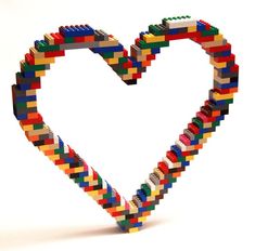 a heart made out of legos on a white background