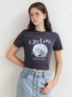 This product is a City Love crop short sleeve T-shirt designed for a stylish and trendy look. The T-shirt features a bold graphic with the text City Love and a cityscape on the front, adding a unique touch. It is made from soft, breathable fabric for all-day comfort. This crop short sleeve T-shirt is perfect for casual wear and summer outings.- This crop short sleeve T-shirt features a bold graphic with the text City Love and a cityscape on the front, adding a unique touch.- It is made from soft, breathable fabric for all-day comfort.- The T-shirt is designed for a stylish and trendy look, perfect for casual wear.- It pairs well with high-waisted jeans or skirts, making it a versatile addition to any summer wardrobe. City Love, Summer Wardrobe, High Waist Jeans, Cityscape, Breathable Fabric, Casual Wear, Tshirt Designs, High Waisted, Top Outfits