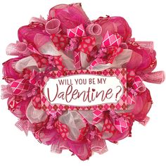 a pink wreath with the words will you be my valentine?