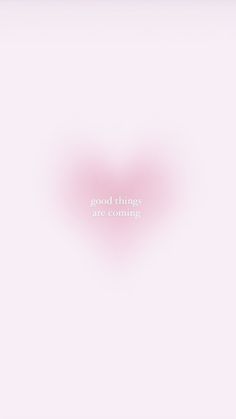 there is a pink heart with the words good things are coming in white on it