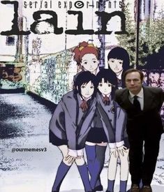 a man standing in front of a poster with anime characters on it's side