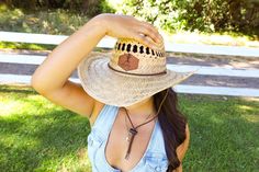 Get ready to give your outfit some western flair with this stylish cowgirl hat! Made from high-quality materials, this classic hat features a wide brim and a chic leather band with a decorative buckle. Perfect for adding a touch of cowgirl charm to any outfit, whether you're out on the ranch or hitting the town. Grab yours today and show off your wild west style! Circumference measures about:  24 1/4 inches Adjustable Country Style Hat Bands For Country Festivals, Adjustable Country Style Hat Bands For Festivals, Brimmed Summer Hat For Country Concerts, Summer Fedora For Country Concerts, Brimmed Hat Bands For Rodeo And Country Festivals, Country Style Hats For Rodeo And Country Festivals, Country Style Rodeo Hat For Country Festivals, Country Style Summer Hats For Country Concerts, Country Style Adjustable Hat Bands For Concerts