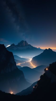 the night sky is filled with stars and lights as seen from high up in the mountains