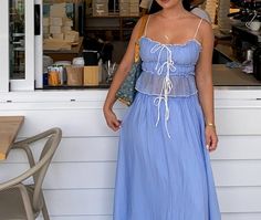 Embrace timeless charm with the Blue Ruffled Sheer Two – Piece Set Maxi Dress. Highlighted by elegant ruffled layers and contrasting black stitching, this dress exudes sophistication. Perfect for both casual outings and special occasions. Blue Dresses With Layered Hem For Spring, Blue Layered Hem Dress For Spring, Chic Layered Dresses For Spring, Feminine Blue Tiered Dress, Feminine Blue Tiered Skirt Dress, Chic Dresses With Layered Hem For Day Out, Chic Blue Tiered Skirt Dress, Swimwear Cover, Two Piece Sets