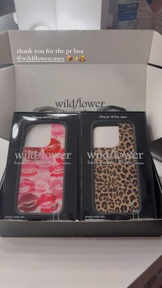 two cases are in the same box, one is leopard and the other is pink