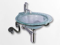 a glass sink with chrome faucet on the side and an arm spout