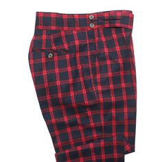 A must-have style in every man’s wardrobe, you will never look boring again with these check plaid trousers in blue and red. Elegantly made with high quality craftsmanship in a straight fit, flat-front style from premium quality wool, these trousers feature a button and zip closure with a wide waistband with two extended fastening tabs. This pair of men's pants is perfect for work and everyday wear, business meetings, parties, gala dinners or summer weddings. Buy it for yourself, or gift it to a Classic Plaid Bottoms With Pockets, Classic Plaid Cotton Bottoms, Classic Red Bottoms For Business Casual, Tailored Classic Red Bottoms, Classic Tailored Red Bottoms, Classic Plaid Pants With Welt Pockets, Classic Fitted Plaid Bottoms, Classic Red Bottoms With Welt Pockets, Classic Plaid Bottoms With Welt Pockets