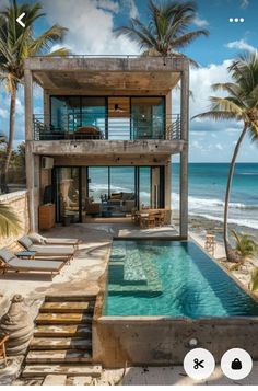 an image of a house on the beach with a swimming pool in front of it