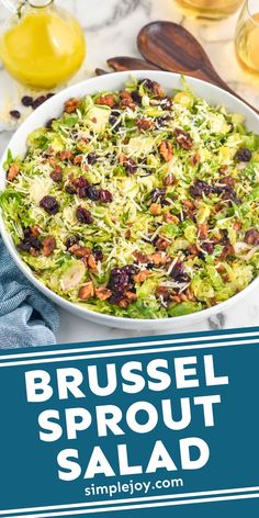 brussel sprout salad with cranberries and pecans in the background