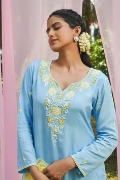 Blue straight kurta with floral pearl and cutdana embroidery and a curved hem. Paired with a pant and scallop edged dupatta. - Aza Fashions Designer Light Blue Straight Kurta Set, Blue Chikankari Embroidery Sharara For Spring, Blue Sharara With Chikankari Embroidery For Spring, Spring Blue Sharara With Chikankari Embroidery, Blue Chikankari Embroidered Sharara For Spring, Blue Designer Palazzo Set For Spring, Spring Designer Blue Palazzo Set, Spring Blue Chanderi Palazzo Set, Blue Palazzo Set With Floral Embroidery And Straight Kurta