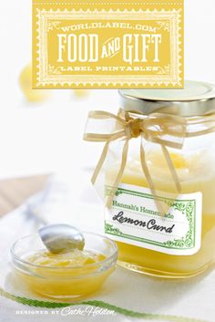 a jar filled with lemon curd sitting on top of a table