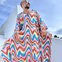 Hand made From start to finish boho wedding kaftan viscose fabric  Men's  caftan Ponchos Billowy dress Unique design rainbow color , multicolor geometric print from Small to 5XL size options Plus size Feel free to Ask for custom made custom made hemline  Gift for him Super comfortable men's clothing  to wear at home or outdoor Comfortable and chic For my all caftans and robes shop link: www.etsy.com/shop/mnouss/ worldwide fast shipping And my new shop link- caftan and more-  www.etsy.com/shop/ma Mens Caftan, Billowy Dress, Caftan For Men, Wedding Kaftan, Kaftan For Men, Plus Size Kaftan, Men Kaftan, Long Caftan Dress, Kaftan Tunic