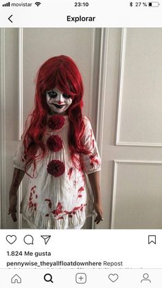 a woman with red hair and makeup is dressed as a scary clown